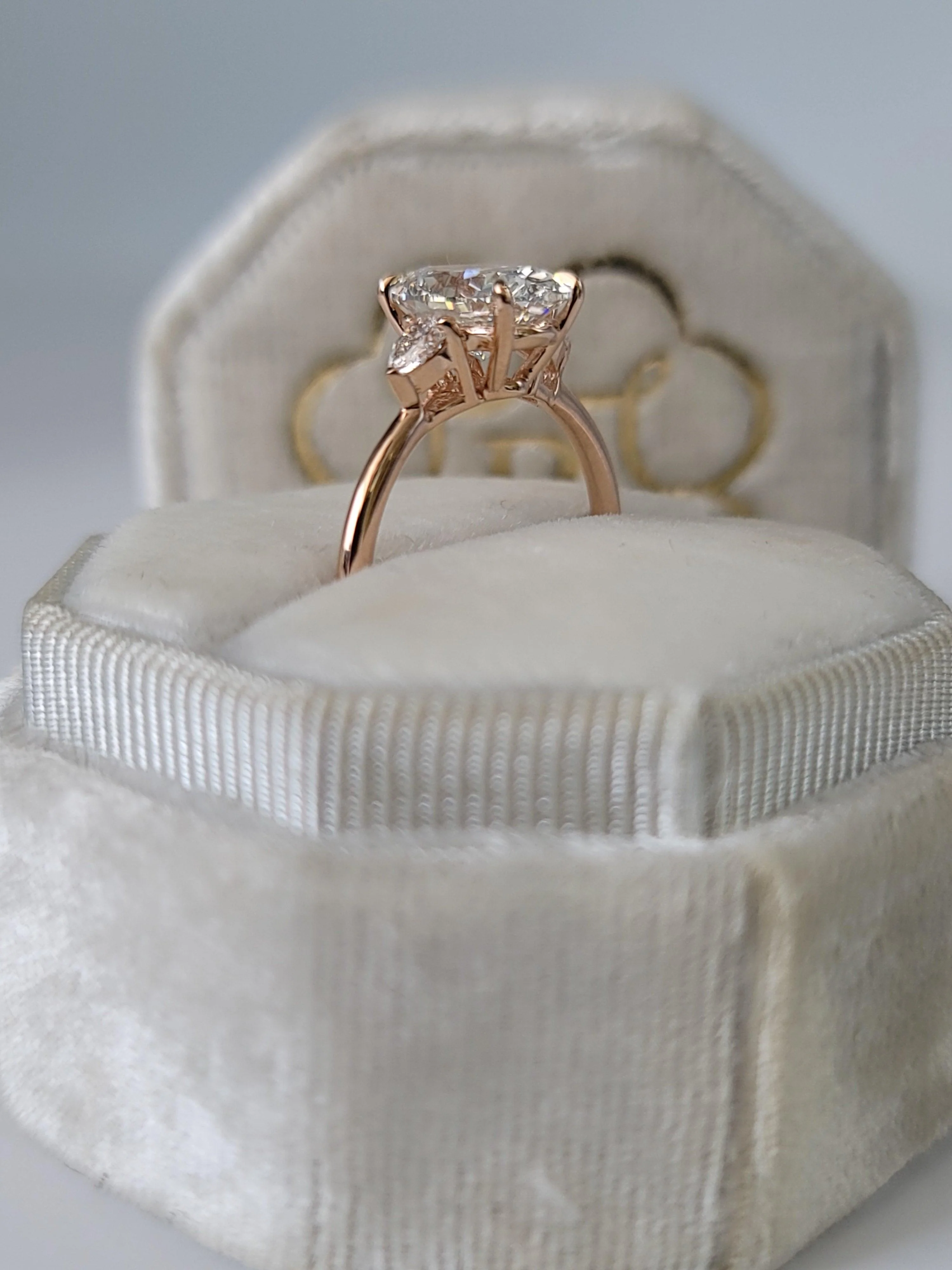 2.35 Carats Lab Grown Oval Cut with Pear Shape Side Stones Diamond Engagement Ring in Rose Gold - Image 7